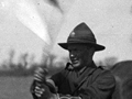 New Zealand troops signalling with flag