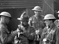 Inspecting gas masks in 1918