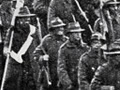 Infantry marching over Grafton Bridge