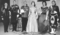 The Fergussons and senior staff in formal dress