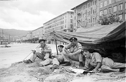 Troops under canvas reading