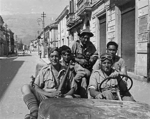 New Zealand troops driving jeep in Sora