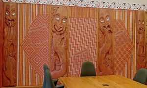 Maori carvings on wall