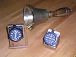 A bell and two clocks