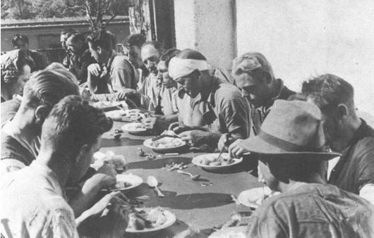 Soldiers dining outside