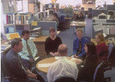 Meeting in open-plan office