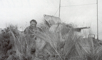 Woman driving tank