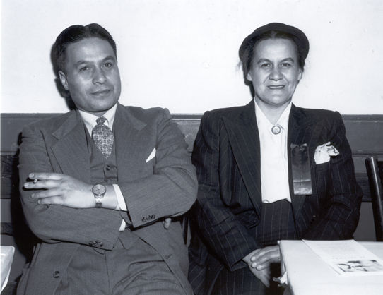 Man and woman seated side by side