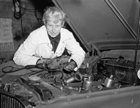 Sybil Lupp under car bonnet