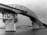 Fred Ladd flies plane under Auckland Harbour Bridge