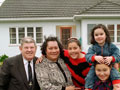 Family in front of state house