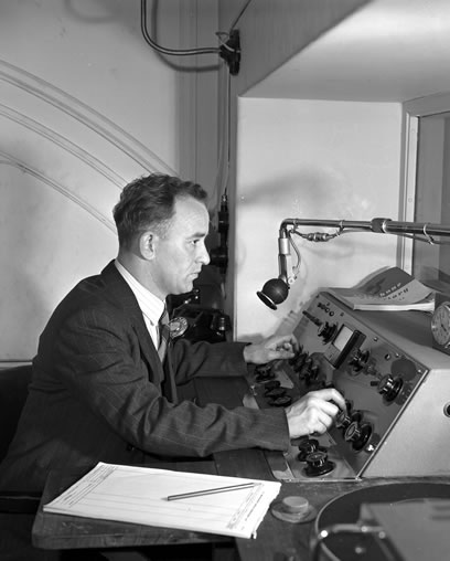 Mr Ensor at radio desk 