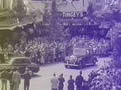 Royal car drives by crowds