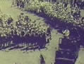 Queen waves to cheering children from car