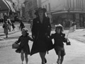 Woman on street on VE Day