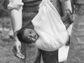 District nurse weighing baby, Waihara