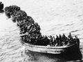 Landing boats carrying New Zealand infantry