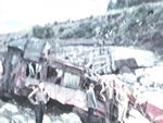 men in front of wrecked train