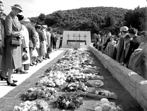 flowers and wreaths at unveiling