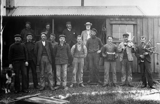 Photo of group of men with instruments