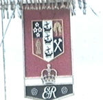 Banner with coat of arms and 'ER'