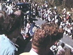 Crowd line street cheering royals